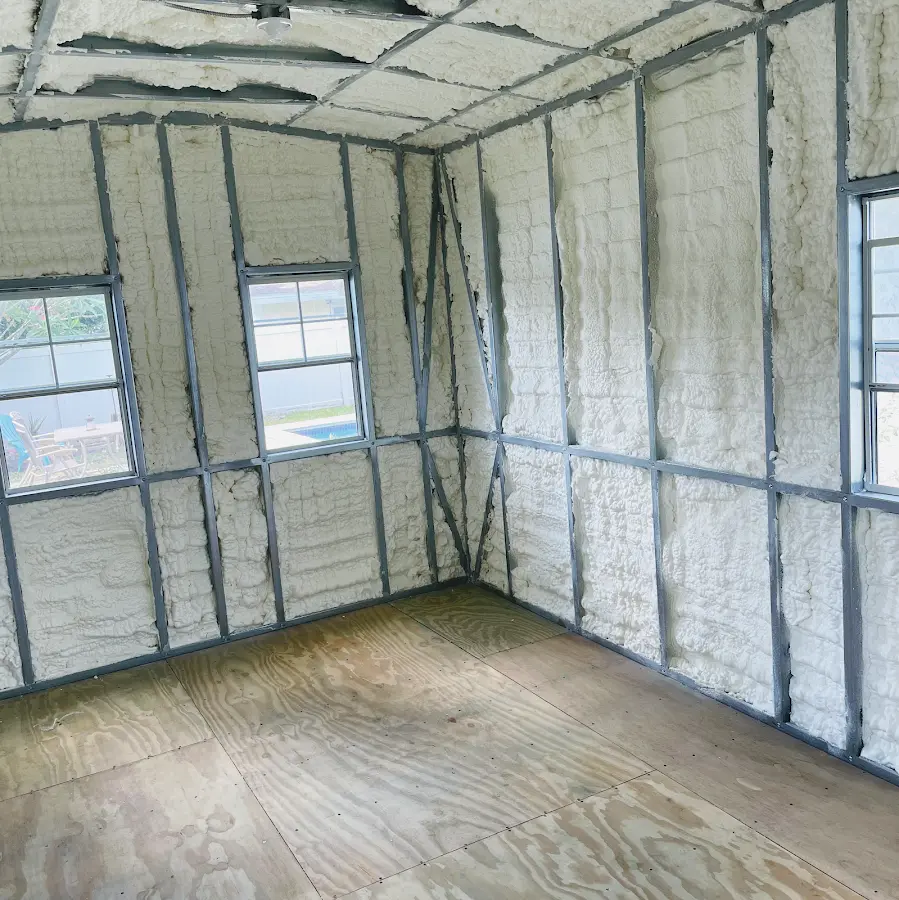 Closed-cell spray foam insulation applied to wall cavities in a residential project in Cerritos